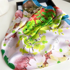 Elegant floral silk scarf for women featuring vibrant colorful prints and smooth satin finish