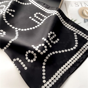 Elegant black satin scarf with white noble polka dot print in 70cm square layout
