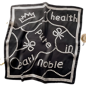 Polka dot black silk square scarf with elegant white lettering for professional business wear