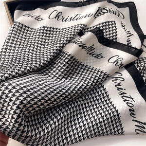 Elegant houndstooth silk scarf with black borders for hair and handbag styling