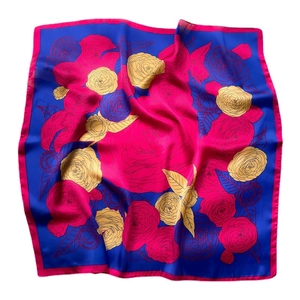 Royal blue silk scarf with pink camellia flower print and elegant satin texture finish