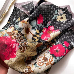 Elegant square silk scarf with floral pattern and vintage monogram in a gift box