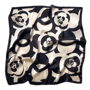 Elegant black and white camellia pattern square silk scarf with a satin finish