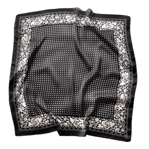 Square silk scarf with black floral rose pattern and white geometric grid design