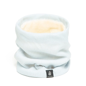 Detail of light blue knitted neck warmer showing thick fleece lining and brand label