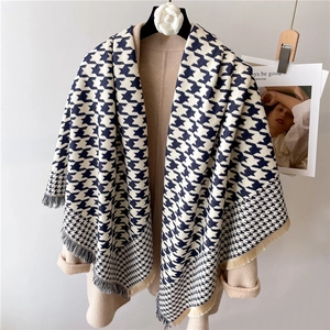 Classic navy and beige houndstooth scarf with fringe tassels and thick warm texture