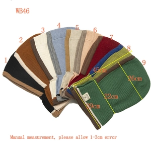 Flat lay of knit balaclava hoods in 9 colors showing detailed ribbed texture and dimensions