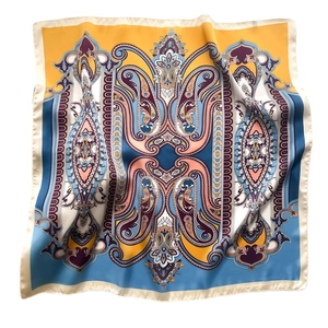 European style silk square scarf featuring vibrant paisley print and decorative border