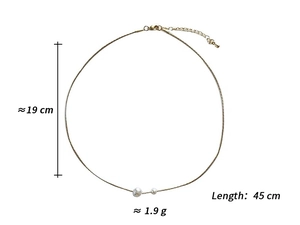 Detail of gold pearl necklace showing lobster clasp and 45cm adjustable chain specs