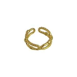 Double-layered twisted gold ring with textured irregular lines and open minimalist design