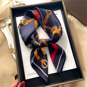 Navy blue silk-like square scarf with equestrian print and gold chain in a gift box