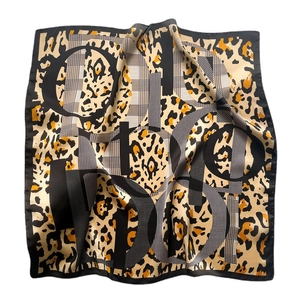 Luxurious leopard print silk scarf with stylish letter pattern on white background