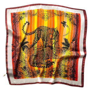 Square silk scarf with leopard, palm leaves, and birds on orange-yellow stripes