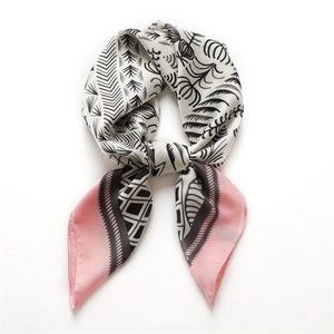 70cm geometric silk square scarf featuring black botanical patterns and pink borders