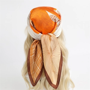 70cm silk-like square scarf with orange floral sketch patterns worn as a stylish headscarf