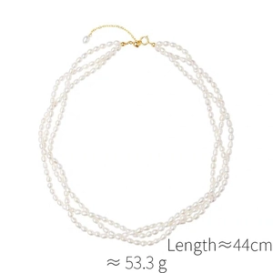 Detailed view of multi-layer baroque freshwater pearl necklace with gold spring clasp