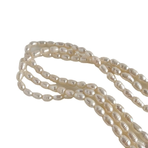 Baroque multi-layer natural freshwater rice pearl necklace with gold-plated clasp