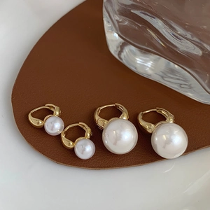 Two pairs of elegant gold-plated geometric pearl hoop earrings in small and large sizes