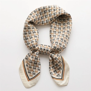 Elegant equestrian horse print silk scarf with black and orange geometric pattern detail