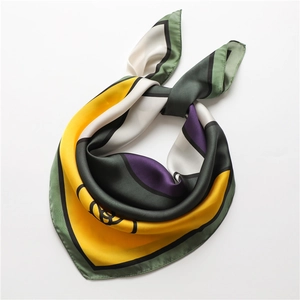 Luxurious geometric color-block silk scarf with abstract patterns and black piped edges