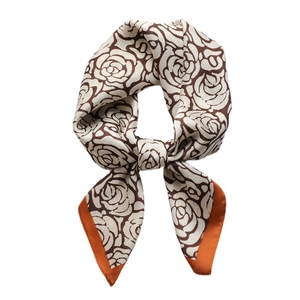 Silk scarf with brown camellia patterns and orange edges on cream background