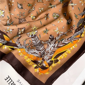 Close-up of bohemian feather print cotton linen scarf with soft texture and rich pattern