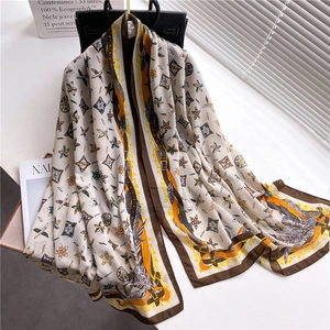 Luxury cotton linen scarf with elegant orange feather and leather belt pattern print