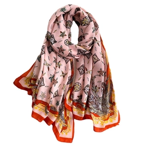 Luxurious pink cotton linen scarf with floral print and vibrant orange border for women