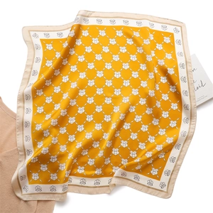 Elegant yellow silk scarf with vintage H letter patterns and horse shield motifs