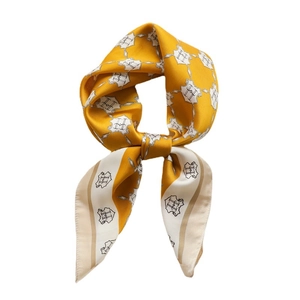 Elegant yellow silk scarf with H-letter pattern in French minimalist style wrap