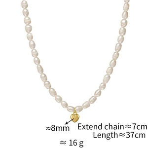 Detail of freshwater pearl necklace featuring a golden heart pendant and size dimensions