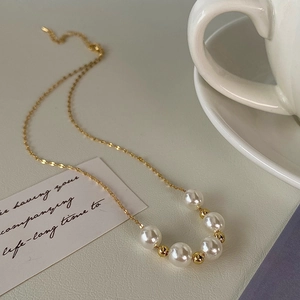 French retro gold plated necklace with five elegant pearls and polished metal beads