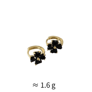 Detail view of 1.6g four-leaf clover drop earrings in gold finish with black stone inlay