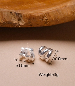 Detail view of silver triple-loop C-shaped earrings with size and weight measurements