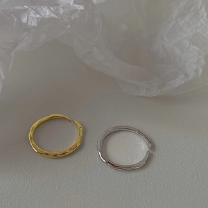 Minimalist adjustable open rings in gold and silver with handmade hammered texture