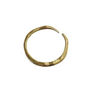 Minimalist adjustable gold plated ring with a modern irregular hammered ripple texture
