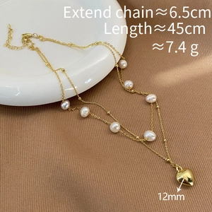Detailed view of double-layer pearl necklace with heart pendant and size measurements