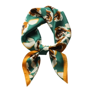 Vintage floral silk scarf with dark green print and contrast hem in a tied bow style