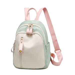 Women's Oxford cloth backpack in mint green and cream contrast colors with large capacity