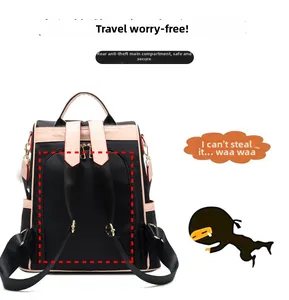 Detail view of water-resistant black nylon backpack with secure rear anti-theft zipper pocket