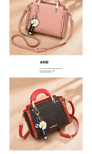 Detail of leather tote bags with daisy charms and logo webbed straps in soft lighting