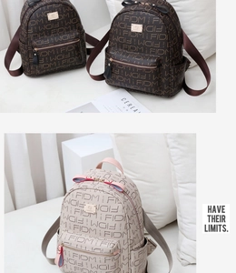 Close-up showing patterned PU leather backpack with FIDM monogram and side pockets