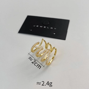 Detailed view of layered gold ear cuff with sparkling zircon inlay and 2cm width dimension
