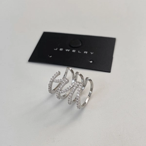 Detail of multi-layer silver-plated ear cuff with pavé-set sparkling zircon stones