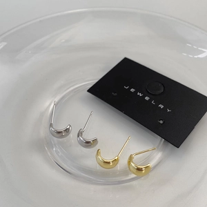 Minimalist C-shaped polished gold and silver hoop earrings set for everyday wear