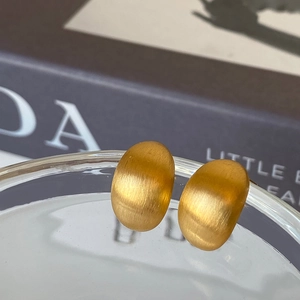 Minimalist gold-plated brushed bean C-shape earrings with a refined matte metal finish