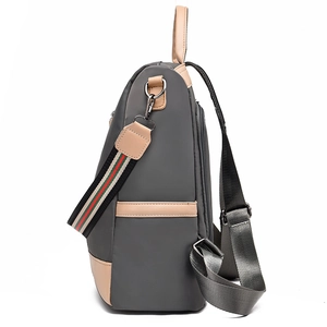 Waterproof oxford backpack for women with red and green stripe straps and silver hardware