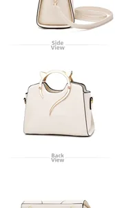 Detail view showing side, back and bottom of cream handbag with gold cat-ear handles