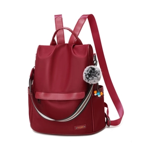 Wasserdichter weinroter Oxford-Rucksack für Damen mit großer Kapazität und Bommel