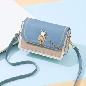 Morandi blue and cream white square crossbody bag with cat-shaped metal clasp and gold chain